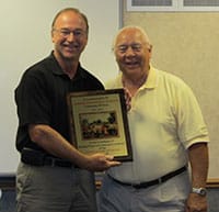 Jerry Foellmi Receives Recognition Plaque from PSCA