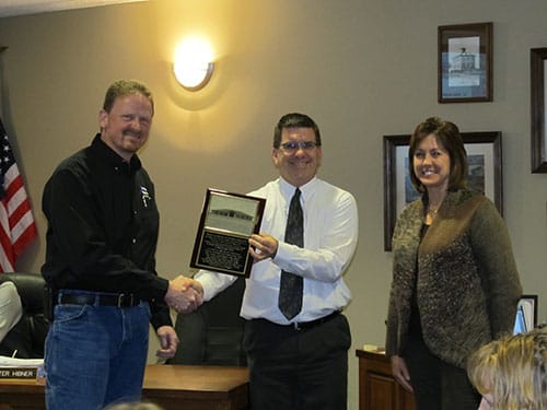 GEC's Kent Fish & Jolene O'Brion Present Dedication Plaque to Portage Community School District Board